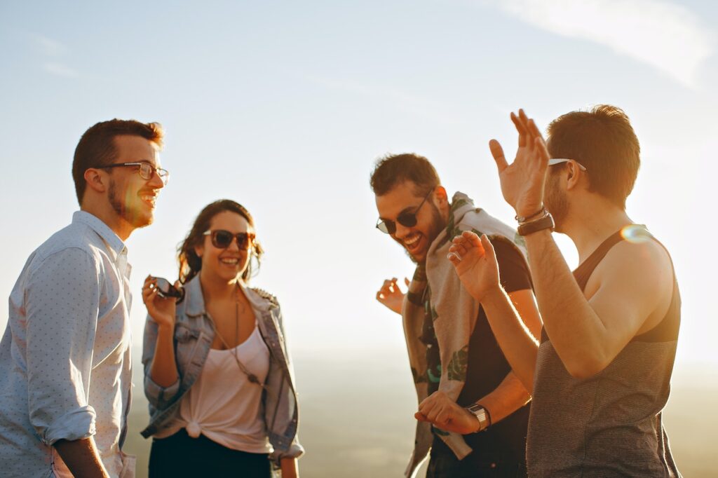 A group of people excited after they found a clue during their scavenger hunt.