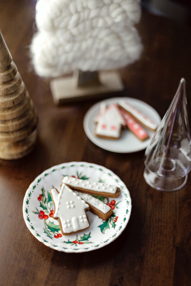 Holiday cookies decorated with icing on a festive plate