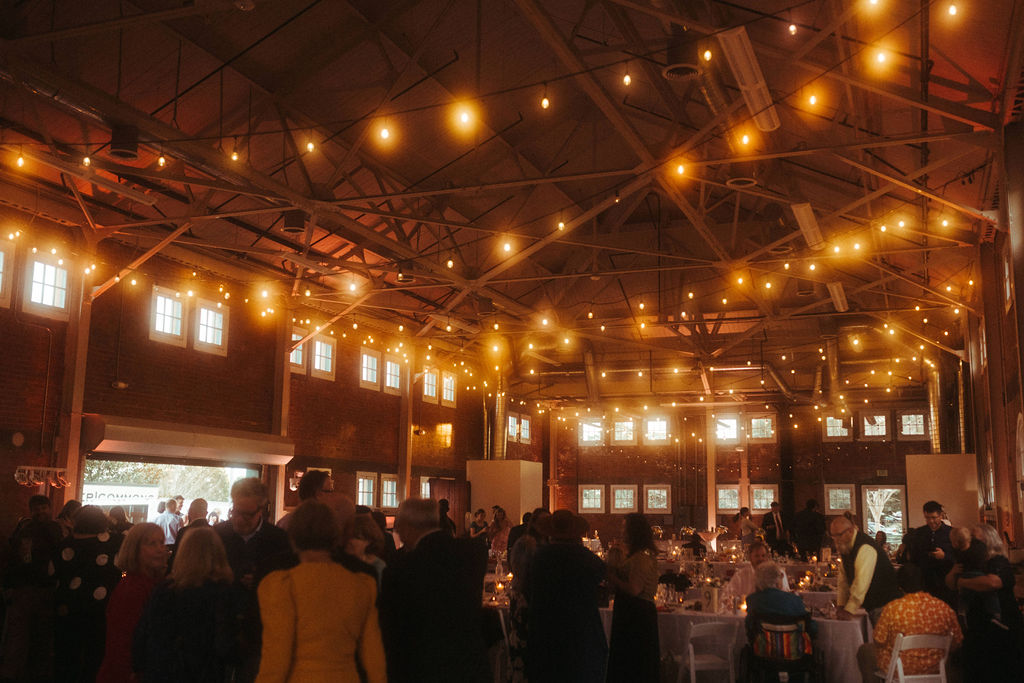 Wedding reception with beautiful yellow lighting at BRICK