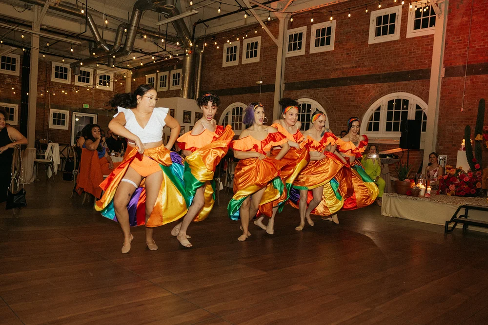Live dancers at an office holiday party at BRICK