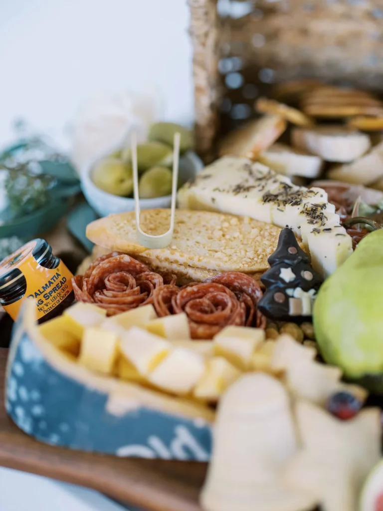 Charcuterie grazing table at BRICK event venue for office holiday party.