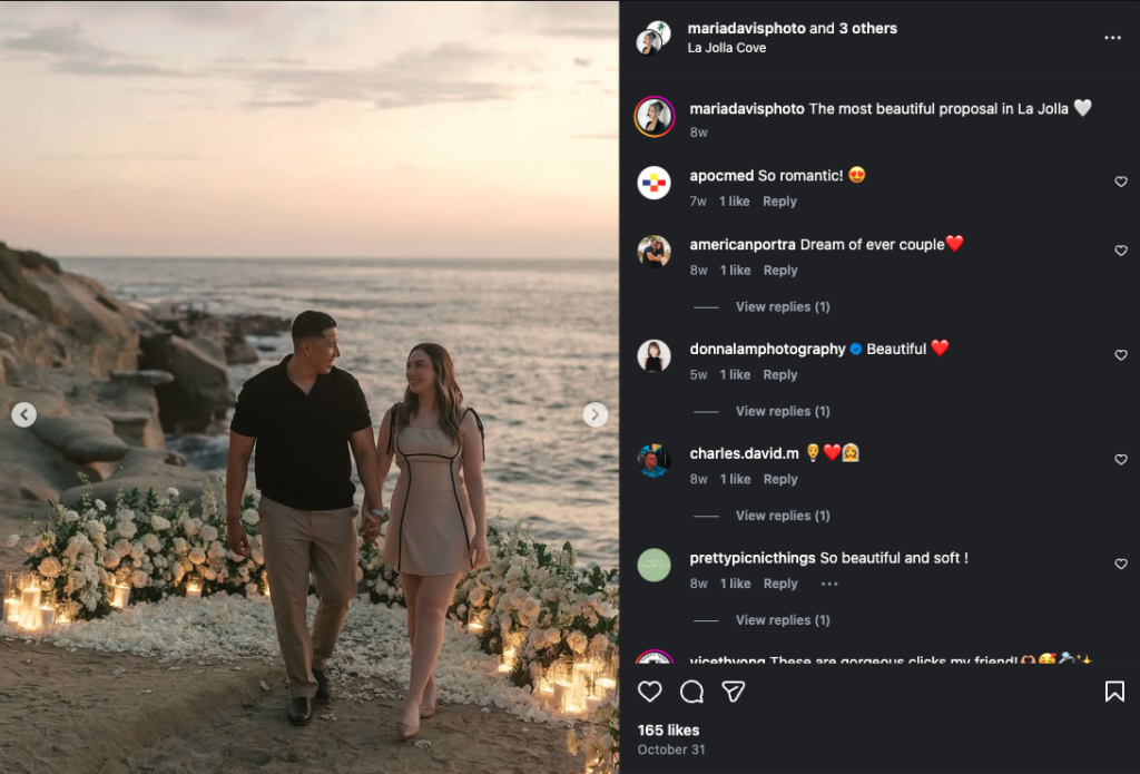 Couple walking along La Jolla Cove in San Diego during a winter engagement photo session
