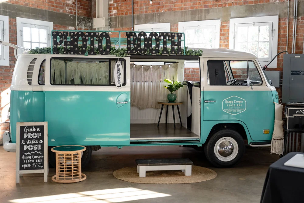 Photo booth bus inside BRICK wedding reception venue in San Diego CA